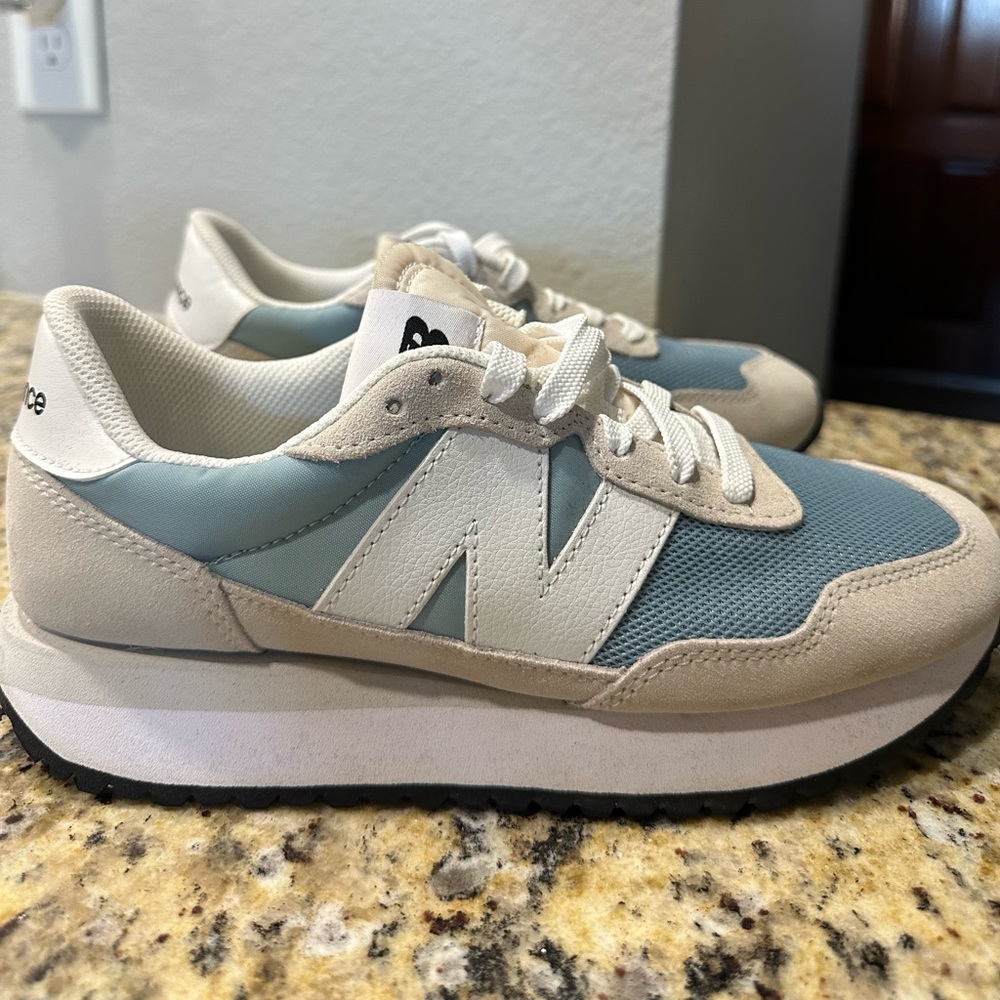 New Balance 237 Cream and Blue Athletic Shoes